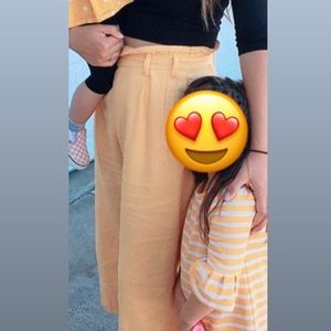 Yellow high waisted pants with buckle